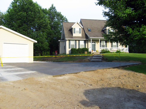 New concrete driveway, walkway and steps built by Akerly Concrete Construction in Millcreek, PA.