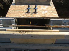 Akerly uses proper construction to reinforce concrete piers (shown).